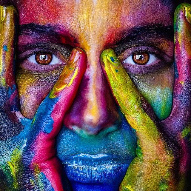 women face with color paint