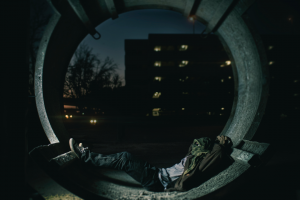 homeless youth in concrete pipe